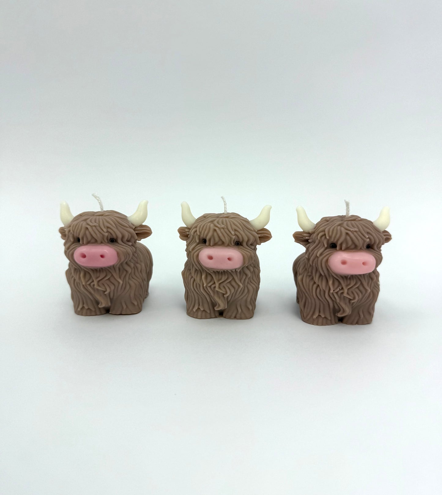 Brown HighLand Cow Candle With White Horns and Pink nose